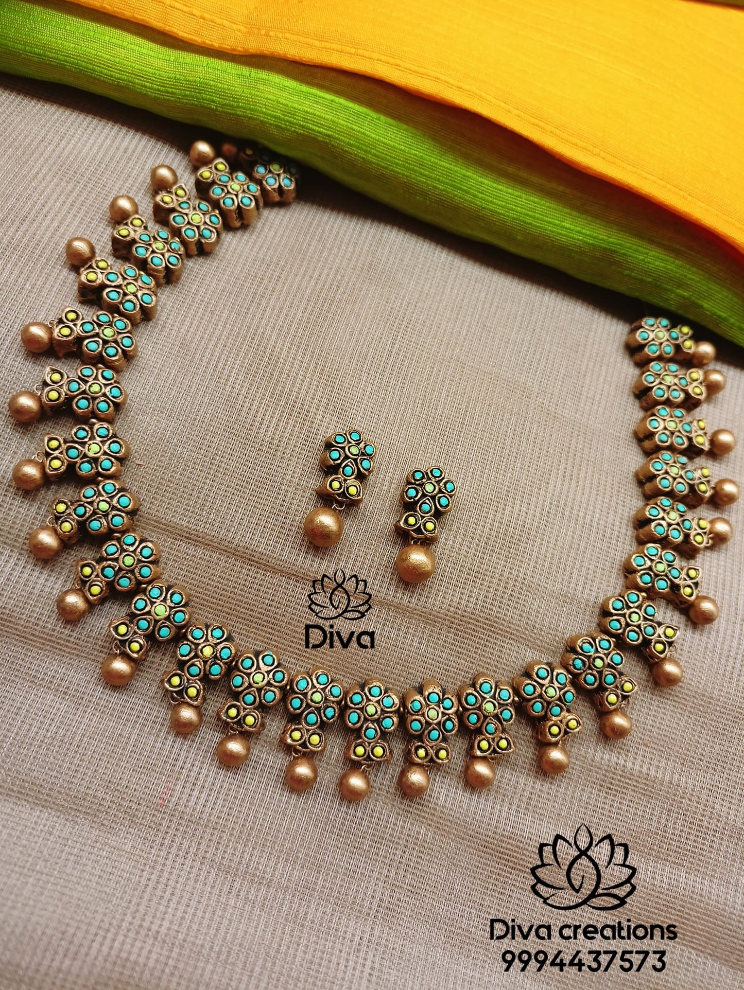 Green-blue floral terracotta jewellery